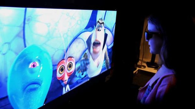 Zoe Ross, 7, of Scullin watches the 3D TV.