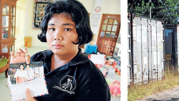 Sao, left, who lost her parents in the tsunami, and containers where bodies still lie.