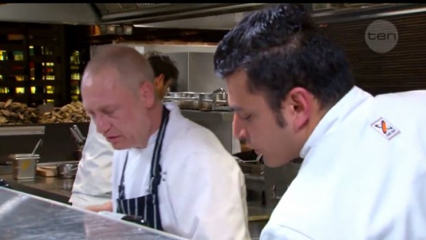 Donovan and Rishi discuss the finer points of rice soup. <i>MasterChef</i>