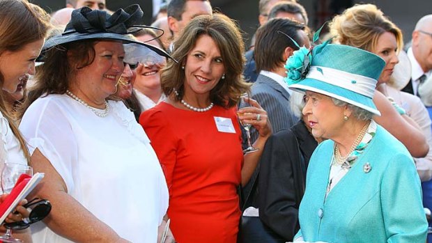Royal treatment … Rinehart dons a "non-pointy" hat in honour of the Queen in Perth last October.