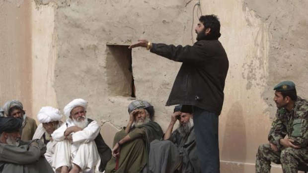 Harsh reality ... ANP commander Shah Mohammad addressing a security shura.