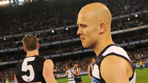 In what could be his last game for Geelong, Gary Ablett shakes hands with Nick Maxwell on Friday.