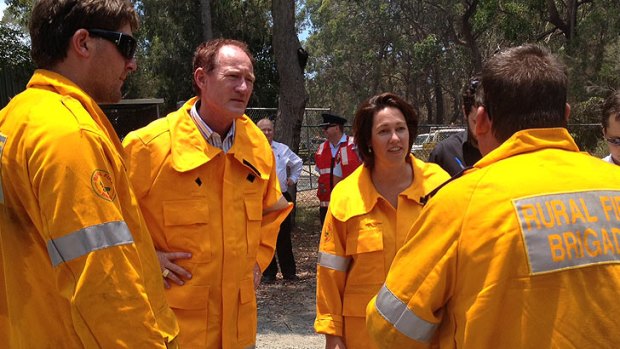 Acting Community Safety Minister Steve Dickson and Pumicestone MP Lisa France get briefed by emergency crews on Bribie Island.