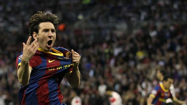 Barcelona's Lionel Messi celebrates scoring against Manchester United during the Champions League final at Wembley Stadium.