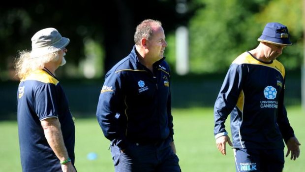 Jake White, centre, has warned the Brumbies to expect a hostile reception in South Africa over the next fortnight.