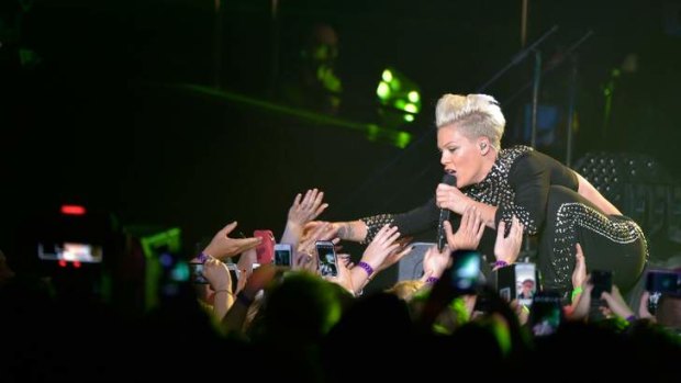 Pink bounces into action on the first night of her The Truth About Lover tour at Melbourne's Rod Laver Arena.