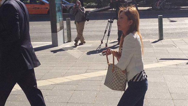 Accused Brisbane ‘madam’ Dan Li outside Brisbane Magistrates Court.
