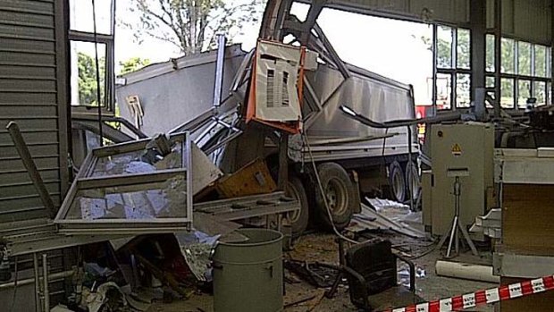 A truck has crashed into a building in Kingsford Smith Drive.