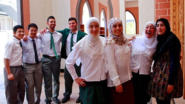 Joy knows no bounds: Students at Malek Fahd Islamic School celebrate getting their results. Photo: Edwina Pickles