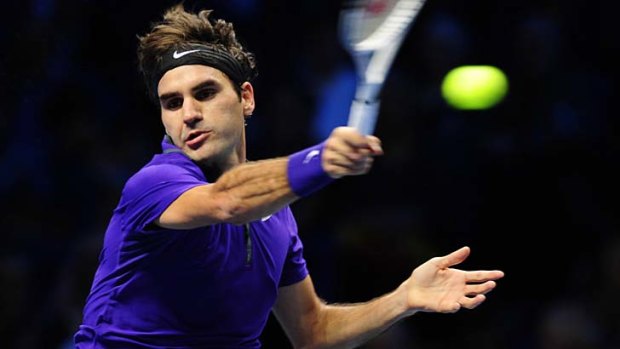 Roger Federer in action against Spain's David Ferrer at the World Tour Finals in the O2 Arena in London.
