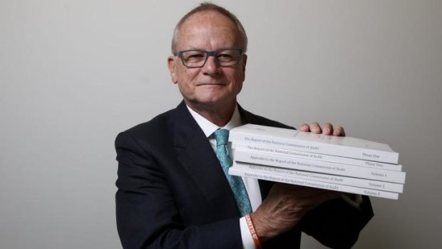 Tony Shepherd uses a Giants wristband to help him lift his audit findings.