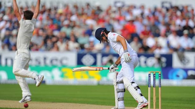 Jackson Bird traps England skipper Alastair Cook lbw just before tea on the opening day of the fourth Test.