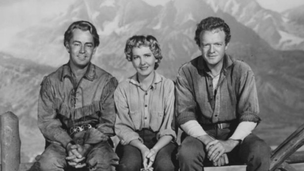 Alan Ladd as Shane and Jean Arthur and Vann Heflin as the Starretts in <i>Shane</i>. Note how Ladd seems tall til you compare leg lengths.