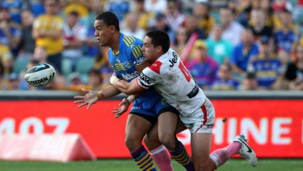 Home sweet home: Will Hopoate offloads the ball against the Dragons on Saturday. 