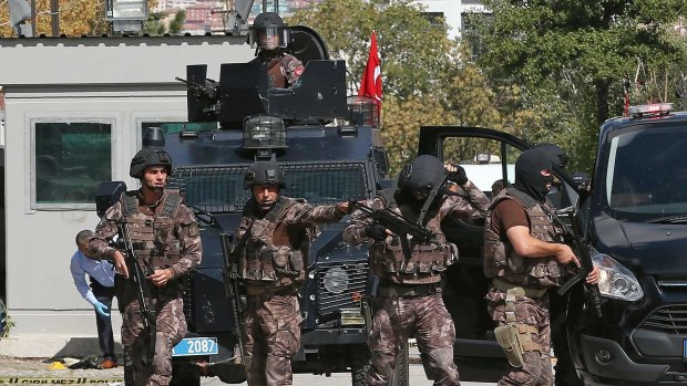 Turkish forces respond to the attack outside the Israeli embassy in Ankara, 