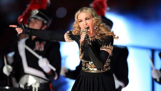 Making you pay ... Madonna puts on a spectacle at the Super Bowl.