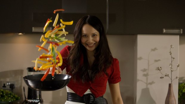 Ching fires up the wok for Chinese New Year.