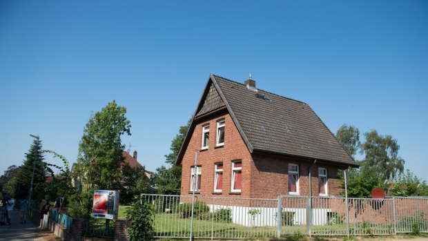 A house being used as accommodation for refugees in Reinfeld, Germany. Suspects were arrested in Ahrensburg and Grosshansdorf east of Hamburg, and in Reinfeld.