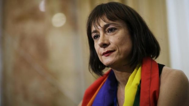 Detained: Vladimir Luxuria, a former Communist lawmaker in the Italian parliament and prominent crusader for transgender rights, was arrested by Russian police for holding a pro-gay banner.
