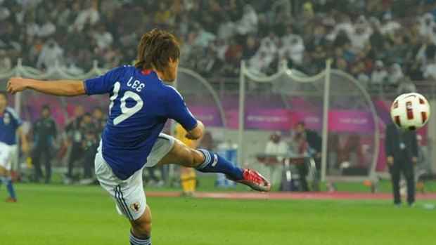 An unmarked Tadanari Lee volleys home Japan's winner.