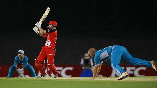 Roaring form: Melbourne Renegades' Ben Rohrer smashes a ball from Heat captain James Hopes to the boundary at Etihad Stadium.