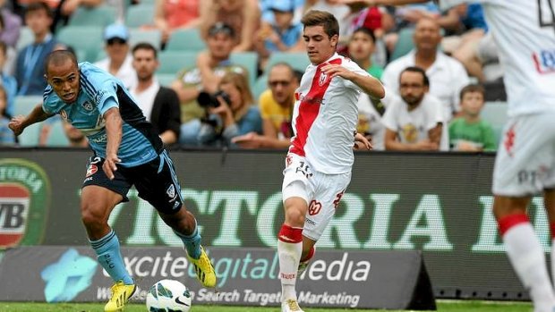 Fabio Alves escapes a Melbourne Heart defender.