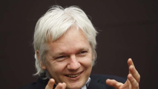 WikiLeaks founder Julian Assange talks during a news conference in central London.