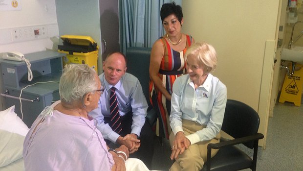 Governor General Quentin Bryce, Campbell Newman and Lisa Newman meet Michael Zanji who was evacuated from Bundaberg Hospital.