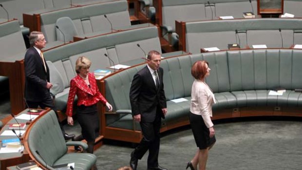 Peace march . . . (from left) Wayne Swan, Julie Bishop, Tony Abbott and Julia Gillard in Parliament.