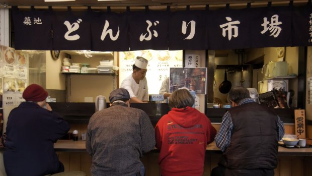 A morning food stall near Tsukiji Fish Market.