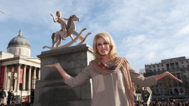 Actress Joanna Lumley unveils a sculpture entitled 'Powerless Structures', by Danish artist Michael Elmgreen and Norwegian artist Ingar Dragset in Trafalgar Square.