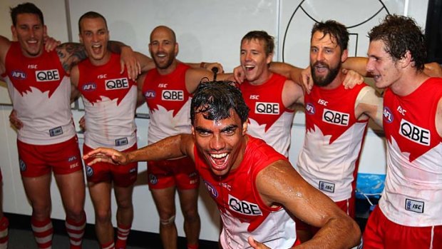 Tony Armstrong celebrates after his first game with the Sydney Swans, who picked him up in the annual trade period.