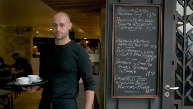 Reserved at all times ... waiter Paolo Turina of Uliveto in Potts Point  Point.
