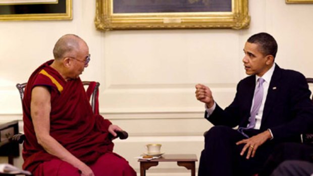 Barack Obama meets the Dalai Lama in the White House Map Room. The official photograph was released by the White House.