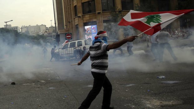 Anger at Syrian regime ... protesters tried to storm the office of the Lebanese Prime Minister, Najib Mikati, amid calls for him to quit.