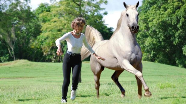 Prancercise creator Joanna Rohrback doing what she loves, her "spooky and goofy and weird and wacky” '80s workout inspired by horses.
