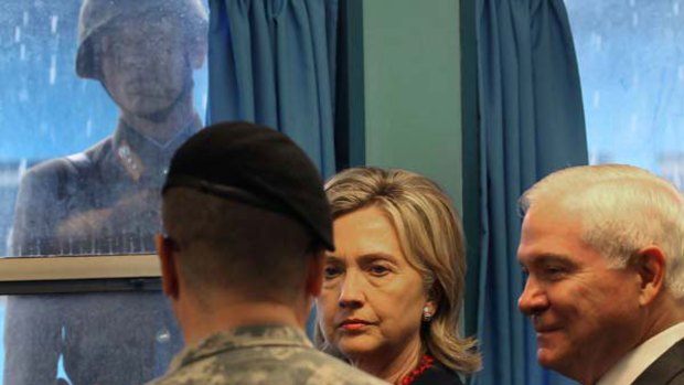 A North Korean soldier with Secretary of State Hillary Clinton and US Defence Secretary Robert Gates. <i>Picture: AFP</i>
