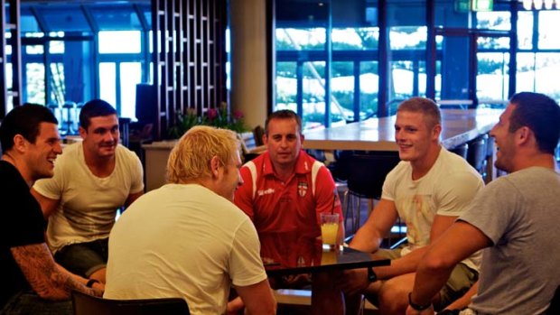 Red alert &#8230; England coach Steve McNamara (red shirt) catches up with English NRL imports, clockwise from left, Luke Burgess, Chris Heighington, George Burgess, Sam Burgess and James Graham this week.