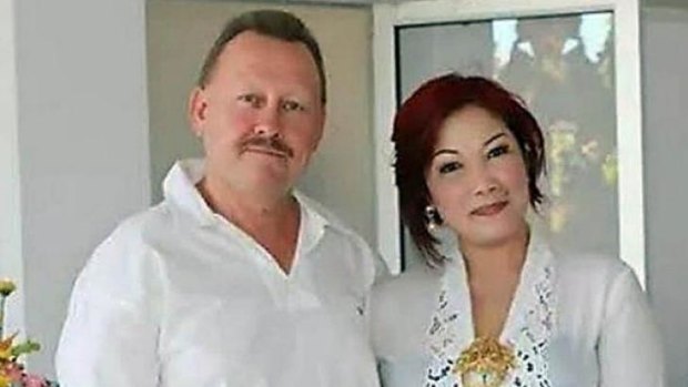 Bob Ellis with his wife Julaikah Noor Aini, who is a prime suspect in his murder.