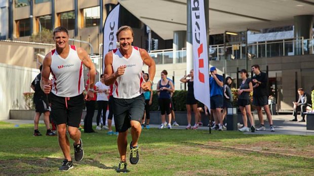 Long-running rivalry: Ironmen Trevor Hendy and Guy Leech will join forces at the City2Surf on August 11.