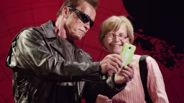Steel, not wax: Arnold Schwarzenegger comes alive at Madame Tussauds to the delight of this fan.