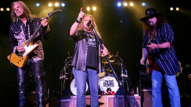 Lynyrd Skynyrd lead singer Johnny Van Zant, center, guitarists Rickey Medlocke, left, and Gary Rossington, who paid tribute to Bob Burns today.