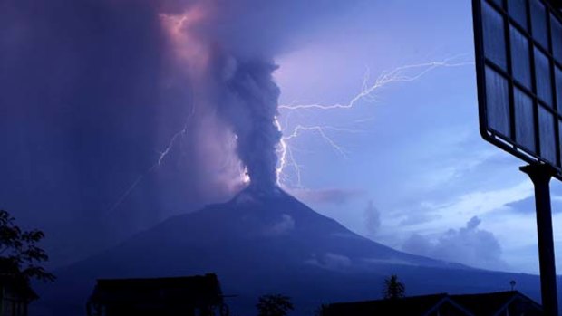 Lightning strikes as Mount Merapi volcano erupts, spewing out clouds of hot gas and debris in Indonesia's Central Java province.