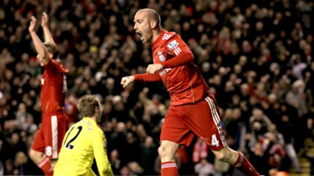 Liverpool's Raul Meireles celebrates after Fulham's John Pantsil knocked in an own goal.