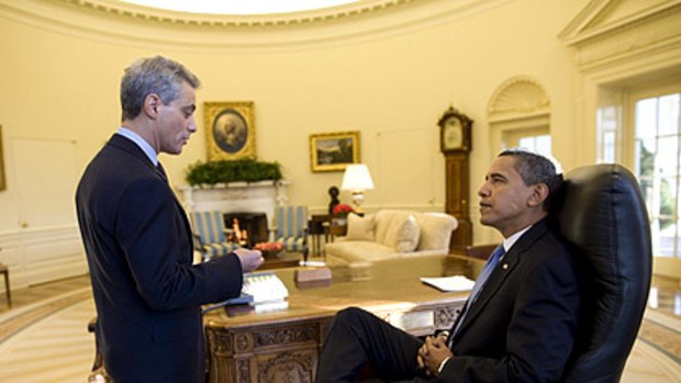 Down to business: Barack Obama talks with White House Chief of Staff Rahm Emanuel.