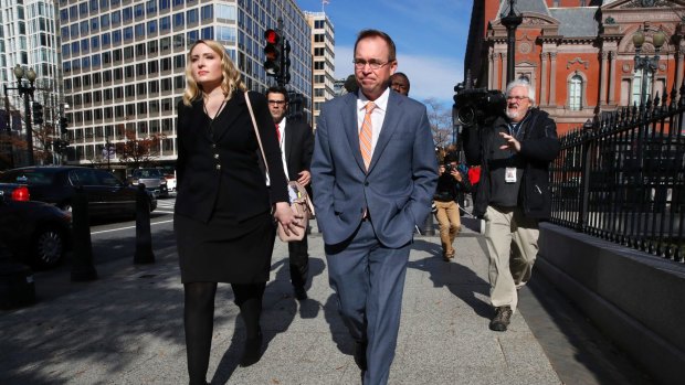 Mick Mulvaney outside the Consumer Financial Protection Bureau.