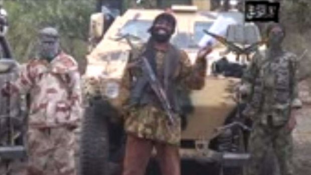 Fanatic: Boko Haram leader Abubakar Shekau (centre) delivers a speech in the video released on Monday.