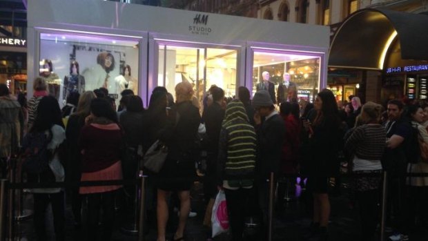 People wait to enter H&M's pop-up shop at Pitt Street Mall.