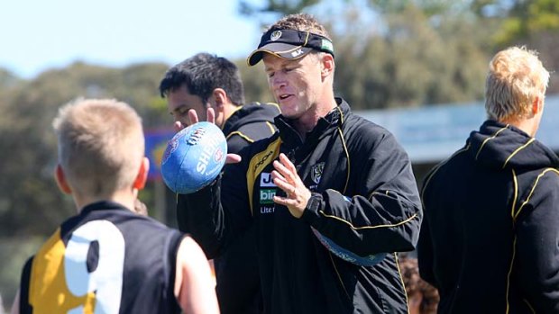 Tiger tough: Richmond coach Damien Hardwick offers some pointers to future hopefuls in Warrnambool.