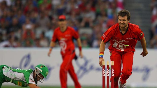 BBL clash: Dirk Nannes of the Renegades attempts to outrun Matthew Wade of the Stars when the Melbourne teams clashed at the MCG on January 7.